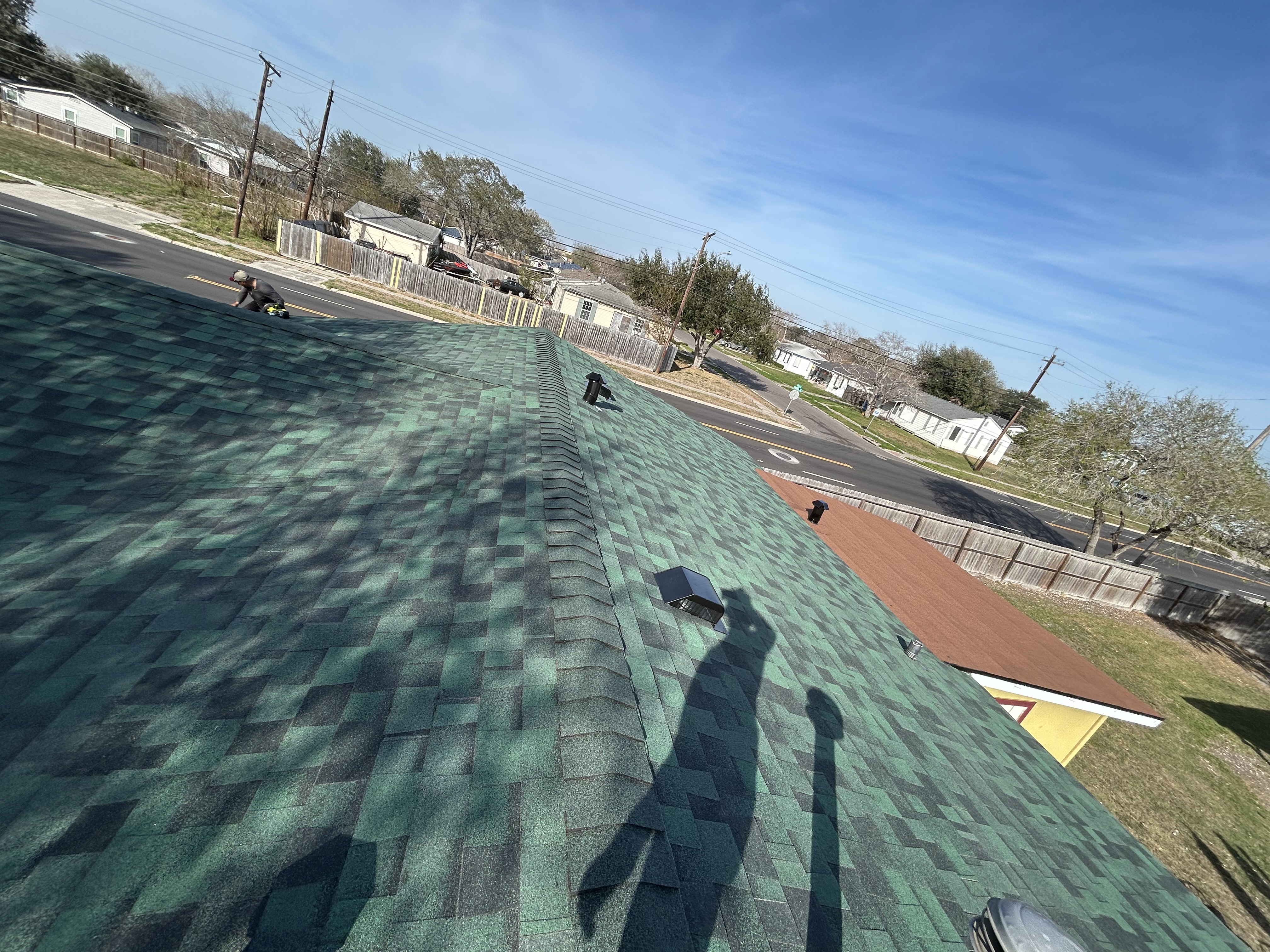 Residential shingle roof replacement by Sniper Roofing LLC